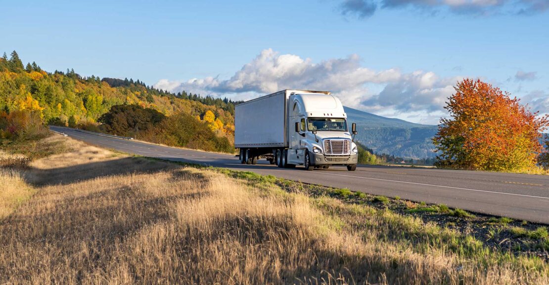 Black Rose tractor and trailer on route
